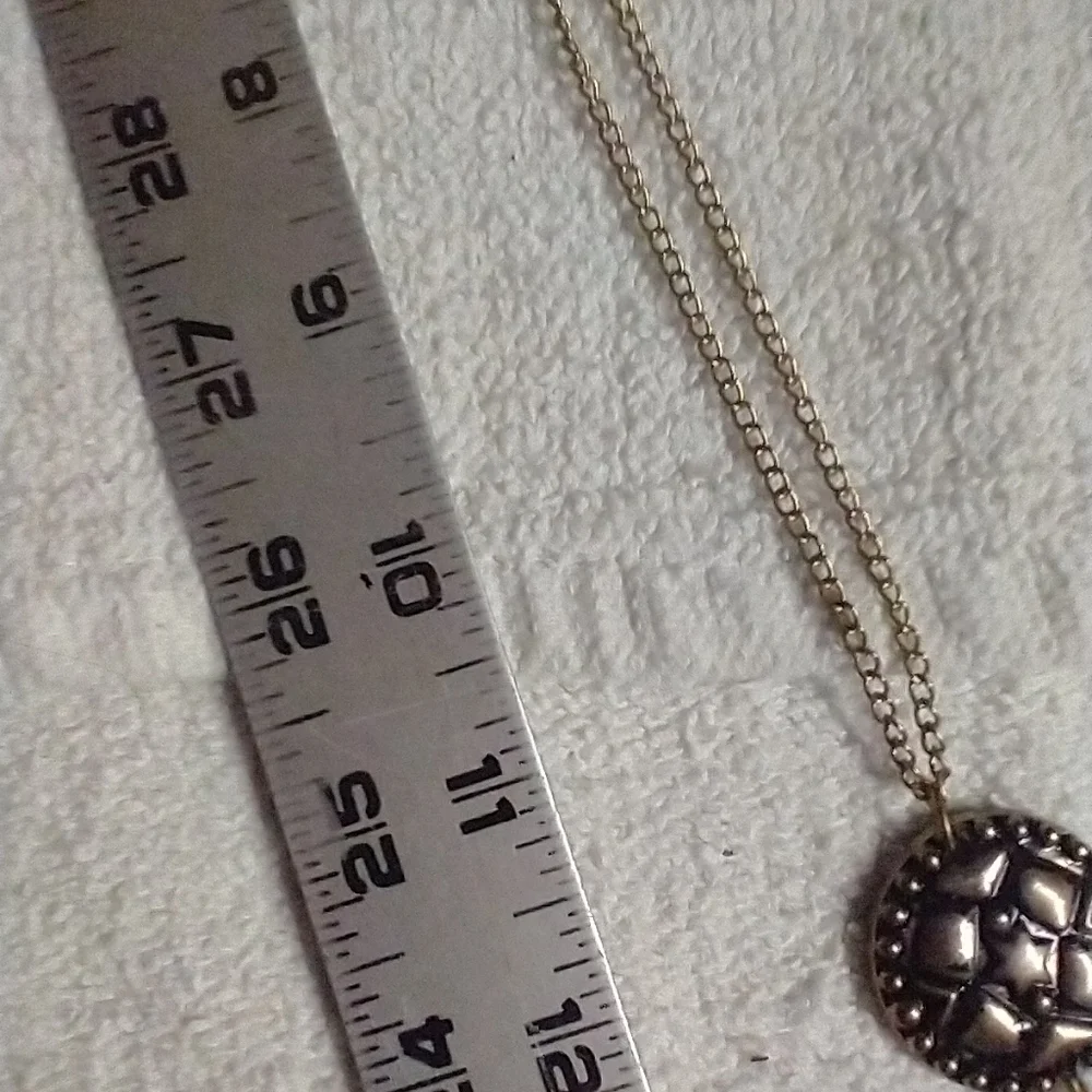 Long goldtone tassel coin chain necklace